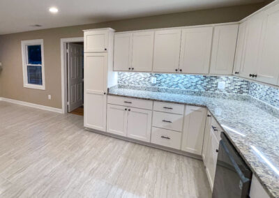 kitchen remodel featuring koch cabinets in white paint shaker door slab drawer front